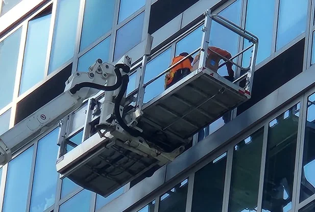 washing windows of various buildings with any access to the facade nyc