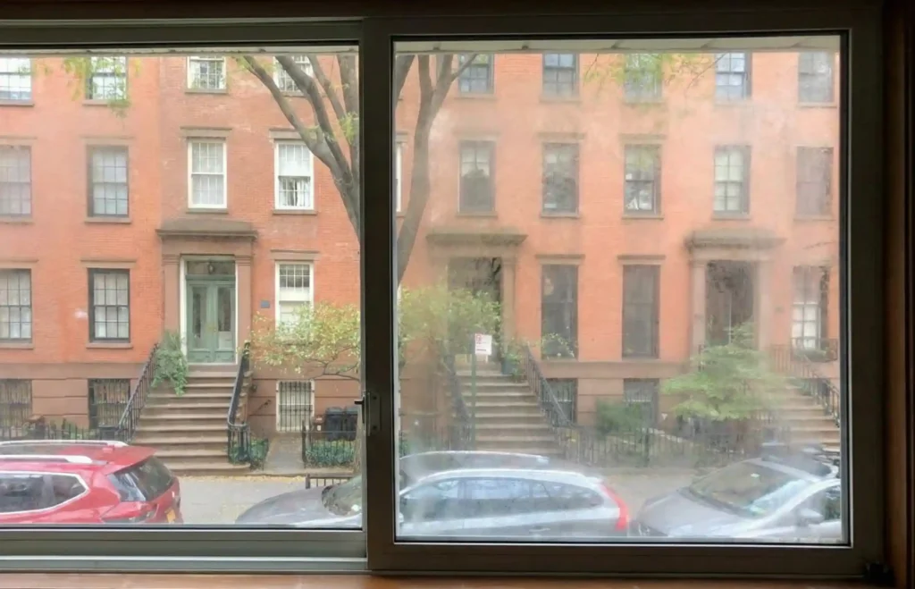 Foggy sliding window with moisture trapped between the glass panes