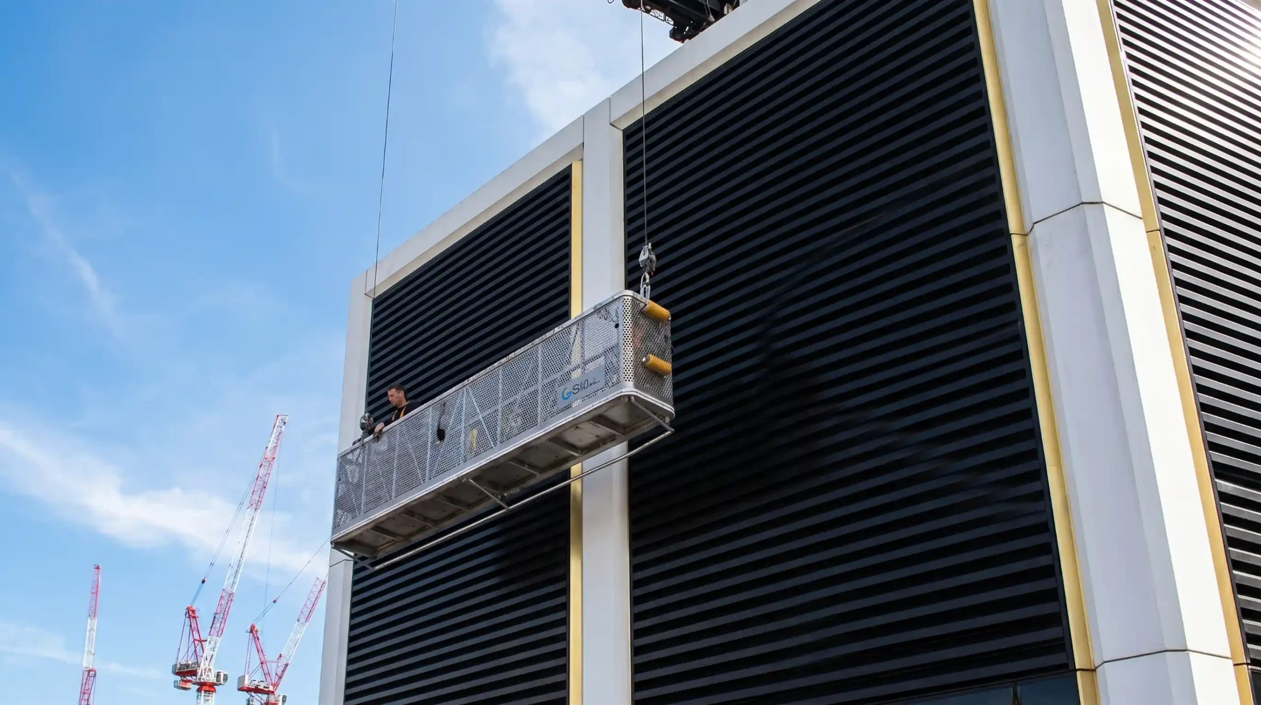 Suspended platform used for commercial window cleaning on a New York building