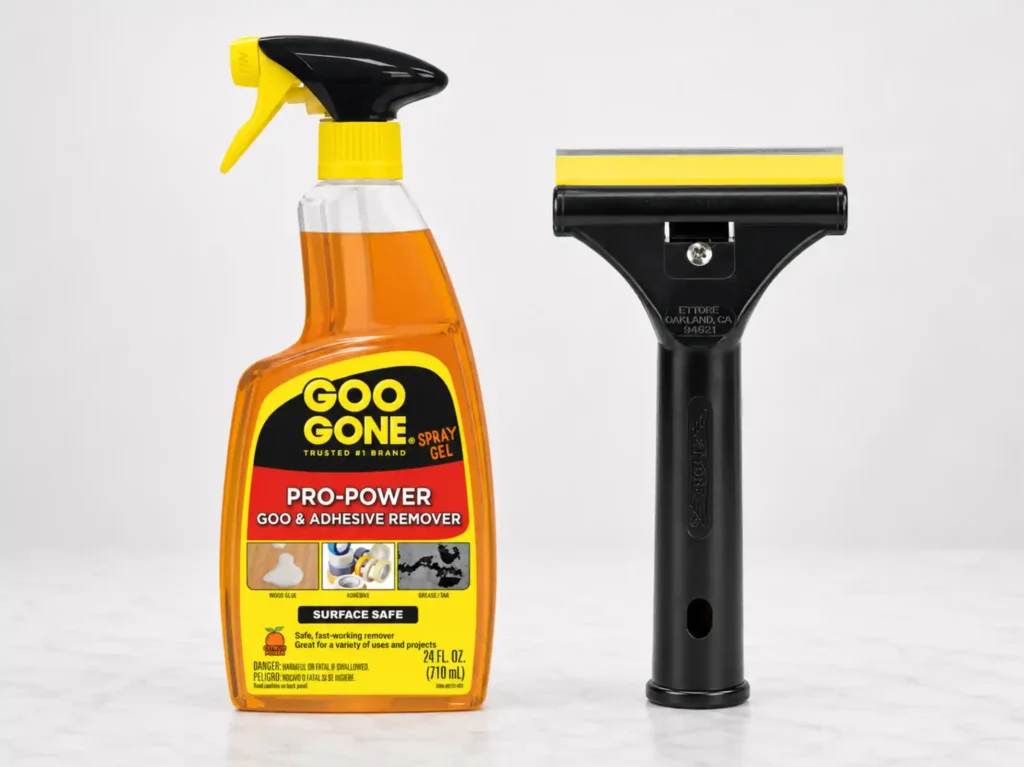 Goo Gone Pro-Power and glass scraper compared for post-renovation window cleaning residue